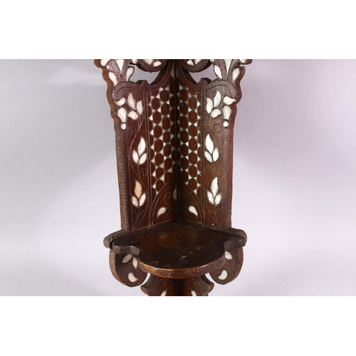 844 - A MOTHER OF PEARL INLAID HARDWOOD CORNER TURBAN STAND, 58cm high.