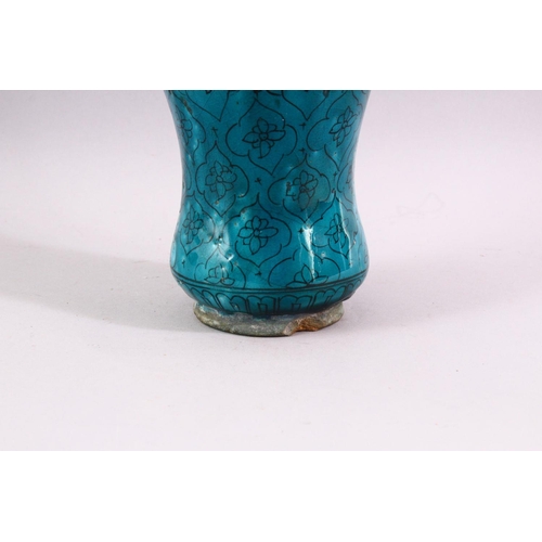 845 - A 19TH CENTURY ISLAMIC MARKET DRUG JAR, with turquoise glazed decoration, 20cm high.