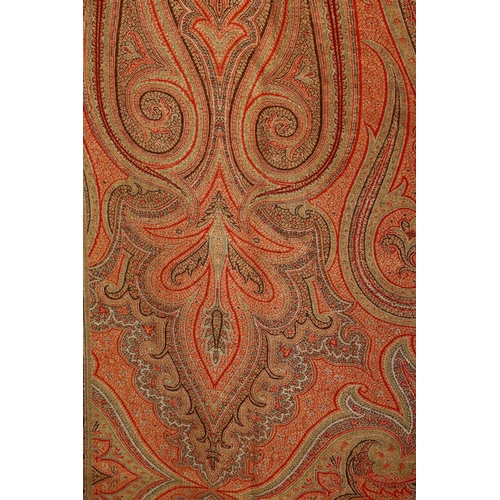 851 - A LARGE PAISLEY BED COVER OR THROW, of typical form, 320cm x 155cm.