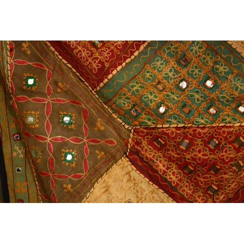 852 - TWO ISLAMIC TEXTILES, both with stitched in mirrored sections, 150cm x 100cm and 100cm x 95cm.