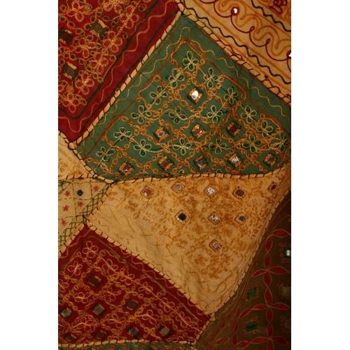 852 - TWO ISLAMIC TEXTILES, both with stitched in mirrored sections, 150cm x 100cm and 100cm x 95cm.