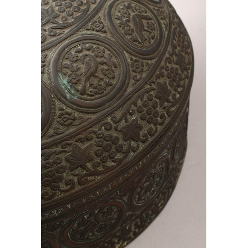 855 - A 19TH CENTURY INDIAN EMBOSSED COPPER BOWL AND COVER, the vessel with embossed decoration with round... 