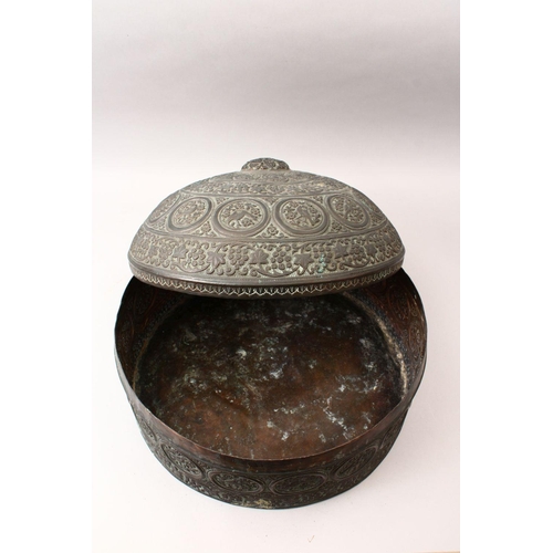 855 - A 19TH CENTURY INDIAN EMBOSSED COPPER BOWL AND COVER, the vessel with embossed decoration with round... 