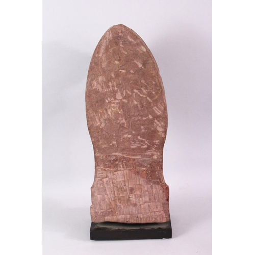 865 - A 12TH CENTURY STYLE CAMBODIAN KHMER STYLE RED SANDSTONE CARVING OF A FOUR ARMED DEITY. 52cms high.... 