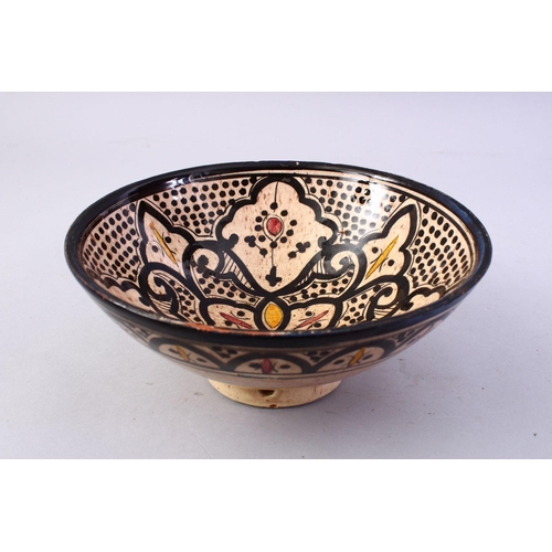 867 - A GOOD ISLAMIC SIGNED POTTERY BOWL - SAFI, the interior decorated with formal floral design, the bas... 