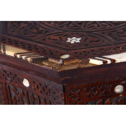 870 - A SMALL 19TH CENTURY INDIAN HARDWOOD OCTAGONAL TRAVELLING OCCASIONAL TABLE, the table inlaid with ca... 