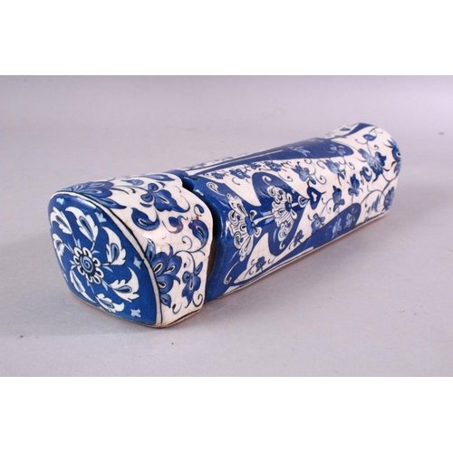 878 - A 19TH CENTURY TURKISH IZNIK BLUE AND WHITE DECORATED PEN BOX, 28cm long.