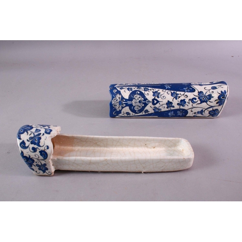 878 - A 19TH CENTURY TURKISH IZNIK BLUE AND WHITE DECORATED PEN BOX, 28cm long.