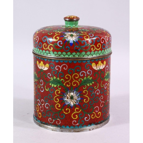 88 - A 19TH / 20TH CENTURY CHINESE CLOISONNE CYLINDRICAL BOX AND COVER, decorated upon a red ground with ... 