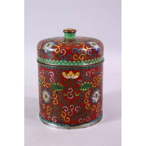 88 - A 19TH / 20TH CENTURY CHINESE CLOISONNE CYLINDRICAL BOX AND COVER, decorated upon a red ground with ... 