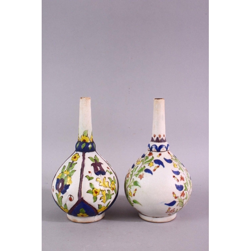 880 - TWO ISLAMIC FLORAL DECORATED ROSEWATER SPRINKLERS, 15cm high.