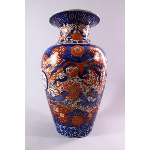 9 - A LARGE JAPANESE MEIJI PERIOD IMARI PORCELAIN VASE, decorated with views of a dragon and phoenix amo... 