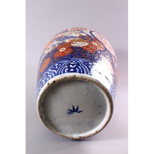 9 - A LARGE JAPANESE MEIJI PERIOD IMARI PORCELAIN VASE, decorated with views of a dragon and phoenix amo... 