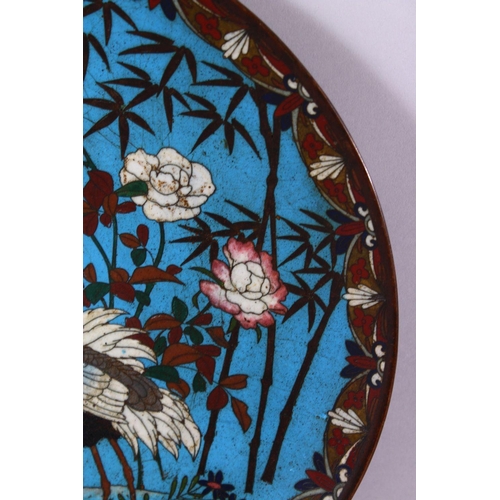 94 - A JAPANESE MEIJI PERIOD CLOISONNE DISH, decorated with scenes of craned in water amongst bamboo, 30.... 