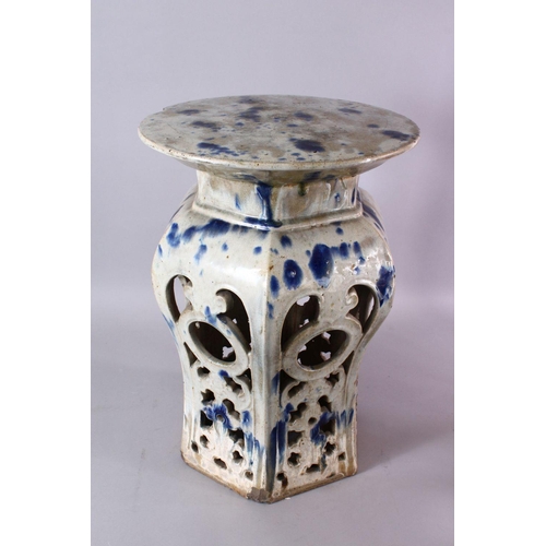 95 - A 18TH / 19TH CENTURY CHINESE BLUE SPLASH GLAZED POTTERY GARDEN SEAT, with openwor sides with bats, ... 