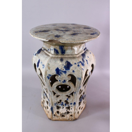 95 - A 18TH / 19TH CENTURY CHINESE BLUE SPLASH GLAZED POTTERY GARDEN SEAT, with openwor sides with bats, ... 