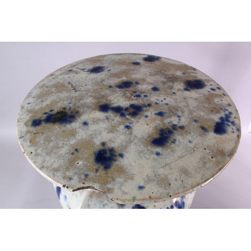 95 - A 18TH / 19TH CENTURY CHINESE BLUE SPLASH GLAZED POTTERY GARDEN SEAT, with openwor sides with bats, ... 