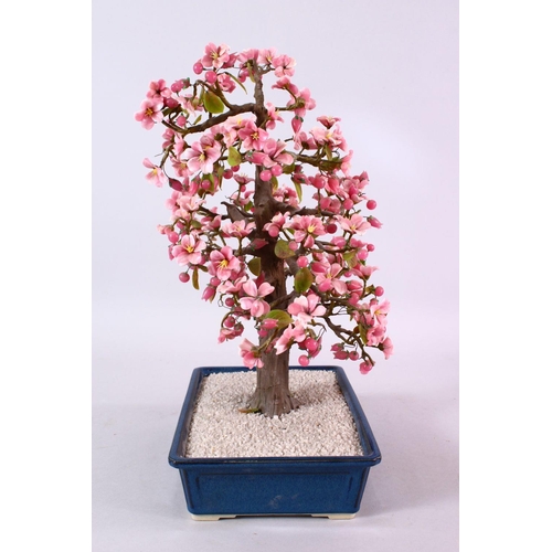 96 - A JAPANESE CARVED HARD STONE FIGURE OF A BONSAI, depicting a cherry blossom tree, 42cm high x 25cm w... 