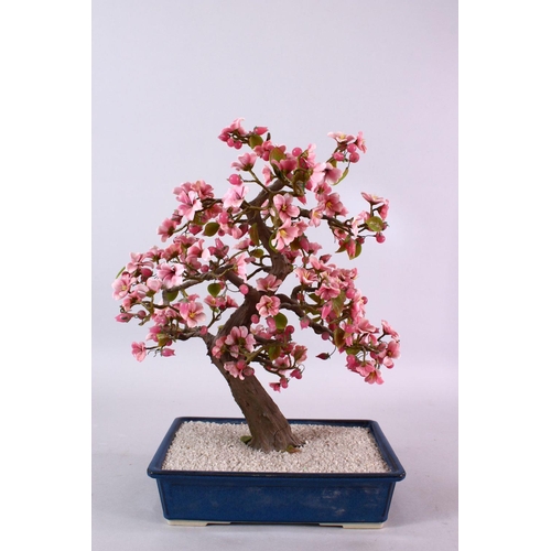 96 - A JAPANESE CARVED HARD STONE FIGURE OF A BONSAI, depicting a cherry blossom tree, 42cm high x 25cm w... 