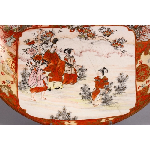 125 - A JAPANESE MEIJI PERIOD KUTANI PORCELAIN CHARGER, with decoration of figures exterior, birds amongst... 