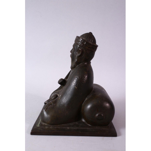 10 - AN 18TH/19TH CENTURY BRONZE SEATED FIGURE OF A SCHOLAR, on a square base, 17cm high.