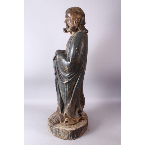 11 - A 18TH/19TH CENTURY CHINESE CARVED WOOD FIGURE OF ROHAN, on a shaped base, 90cm high.