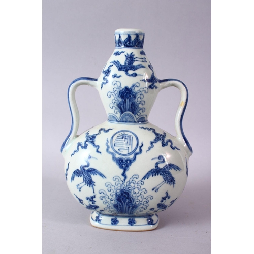 111 - A CHINESE MING STYLE BLUE & WHITE PORCELAIN MOON FLASK, decorated with scenes of phoenix birds among... 