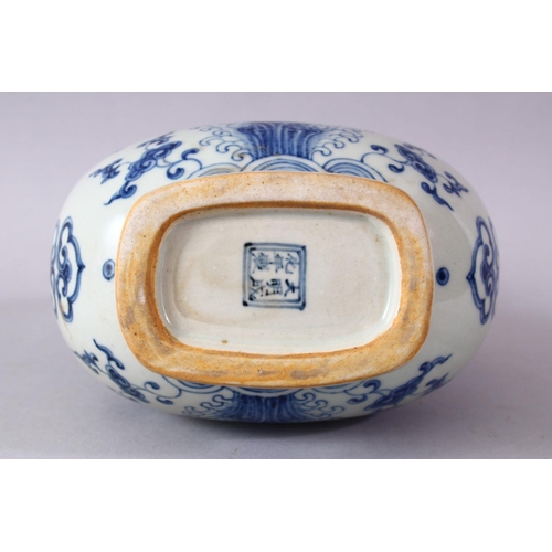 111 - A CHINESE MING STYLE BLUE & WHITE PORCELAIN MOON FLASK, decorated with scenes of phoenix birds among... 