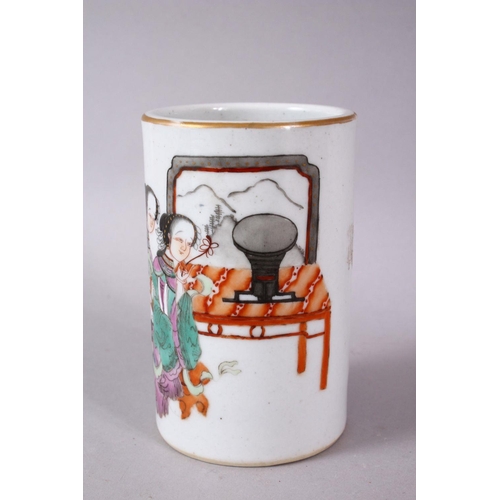 123 - A CHINESE FAMILLE ROSE PORCELAIN BRUSH WASH, painted with two figures in an interior setting, 12cm h... 