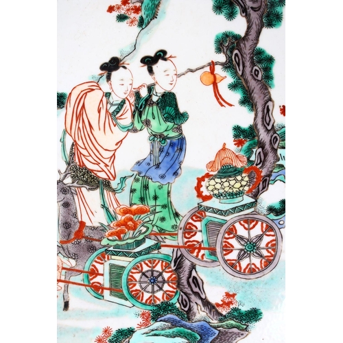 127 - A DECORATIVE 20TH CENTURY FAMILLE VERTE PORCELAIN DISH IN KANGXI STYLE, painted with females in a la... 