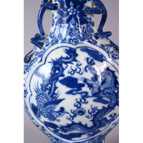 141 - A SMALL CHINESE BLUE AND WHITE PORCELAIN VASE, the neck with moulded animal form handles, the body d... 