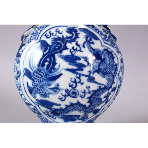 141 - A SMALL CHINESE BLUE AND WHITE PORCELAIN VASE, the neck with moulded animal form handles, the body d... 