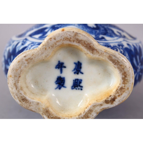 141 - A SMALL CHINESE BLUE AND WHITE PORCELAIN VASE, the neck with moulded animal form handles, the body d... 