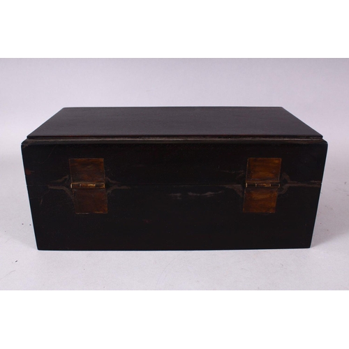 146 - A CHINESE HARDWOOD RECTANGULAR HINGED BOX, 26cm long.