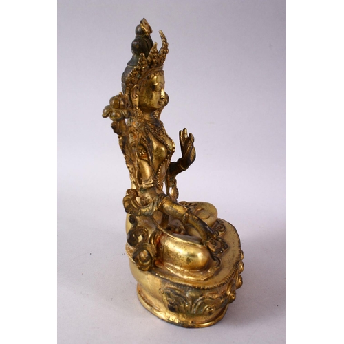 147 - A THAI GILT BRONZE SEATED FEMALE DIETY, 20cm high.