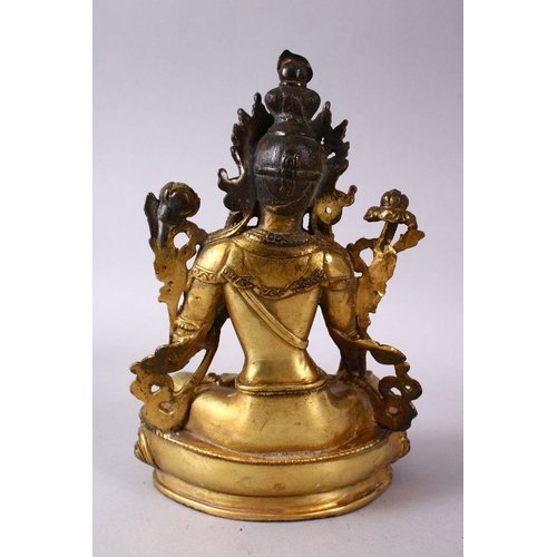 147 - A THAI GILT BRONZE SEATED FEMALE DIETY, 20cm high.