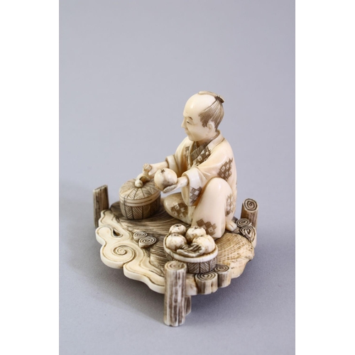 156 - A GOOD JAPANESE MEIJI PERIOD CARVED IVORY OKIMONO, the okimono carved to depict a seated fruit selle... 