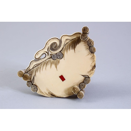 156 - A GOOD JAPANESE MEIJI PERIOD CARVED IVORY OKIMONO, the okimono carved to depict a seated fruit selle... 