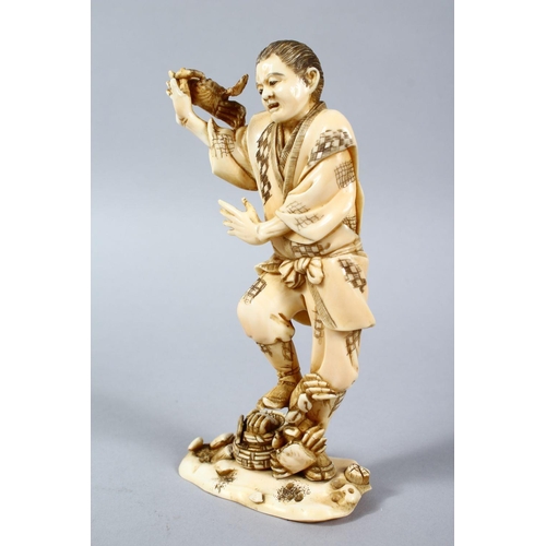 158 - A GOOD JAPANESE MEIJI PERIOD CARVED IVORY OKIMONO OF A FISHERMAN & CRABS, the fisherman stood aside ... 