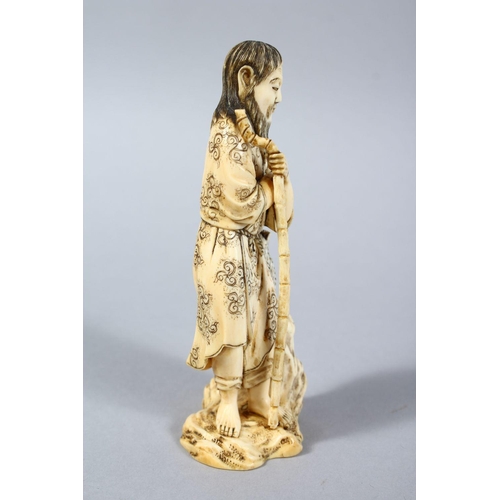 159 - A GOOD JAPPANESE MEIJI PERIOD CARVED IVORY OKIMONO - WAYFAIRER, the man stood leaning upon a stylize... 