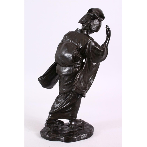 169 - A JAPANESE MEIJI PERIOD BRONZE OKIMONO OF A GEISHA GIRL, stood holding her musical instrument, upon ... 