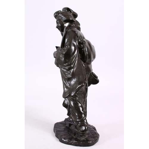 169 - A JAPANESE MEIJI PERIOD BRONZE OKIMONO OF A GEISHA GIRL, stood holding her musical instrument, upon ... 