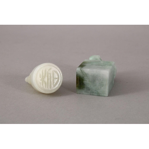 175 - TWO 19TH / 20TH CENTURY CHINESE CARVED JADE / JADEITE SEALS, one white jade depicting a kylin, the u... 