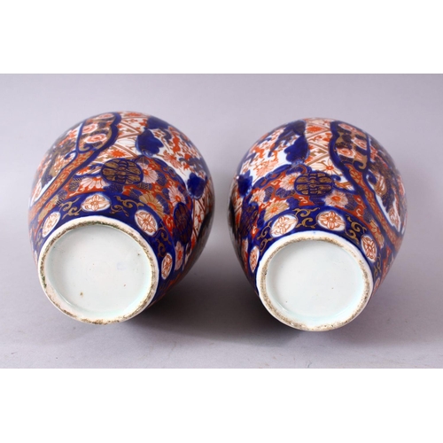 2 - A PAIR OF MEIJI PERIOD IMARI VASES, 26cm high.