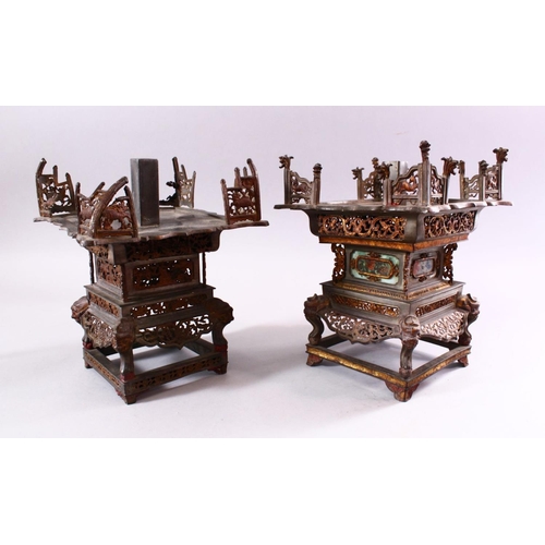 229 - A MATCHED PAIR OF 19TH CENTURY CHINESE SPELTER PAGODA FORM CANDLE STANDS, with cast and pierced deco... 