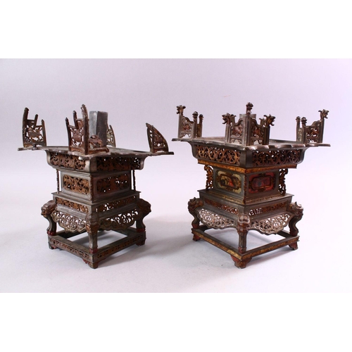 229 - A MATCHED PAIR OF 19TH CENTURY CHINESE SPELTER PAGODA FORM CANDLE STANDS, with cast and pierced deco... 