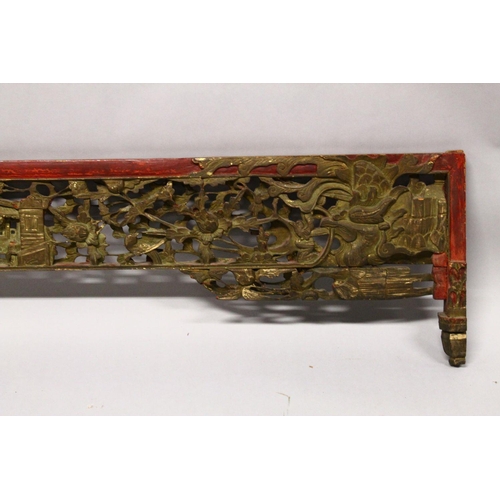 240 - A CHINESE CARVED GILDED AND LACQUERED HEADBOARD PANEL, (AF), 190cm long, 35cm at widest point.