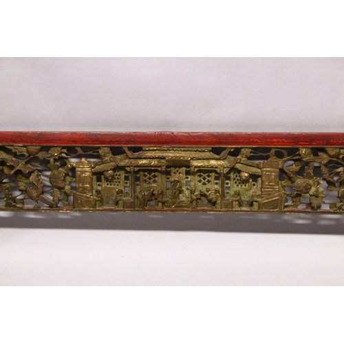 240 - A CHINESE CARVED GILDED AND LACQUERED HEADBOARD PANEL, (AF), 190cm long, 35cm at widest point.