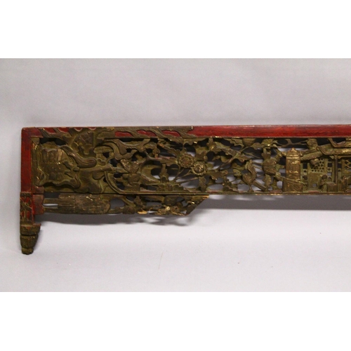 240 - A CHINESE CARVED GILDED AND LACQUERED HEADBOARD PANEL, (AF), 190cm long, 35cm at widest point.