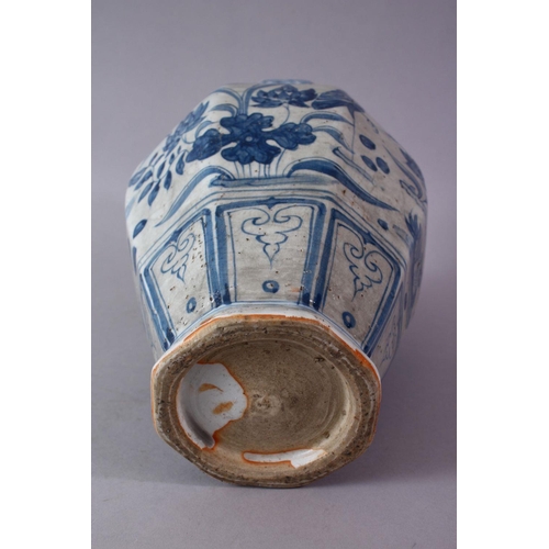 242 - A CHINESE YUAN STYLE BLUE & WHITE TWIN HANDLE PORCELAIN VASE, decorated with scenes of cranes amongs... 